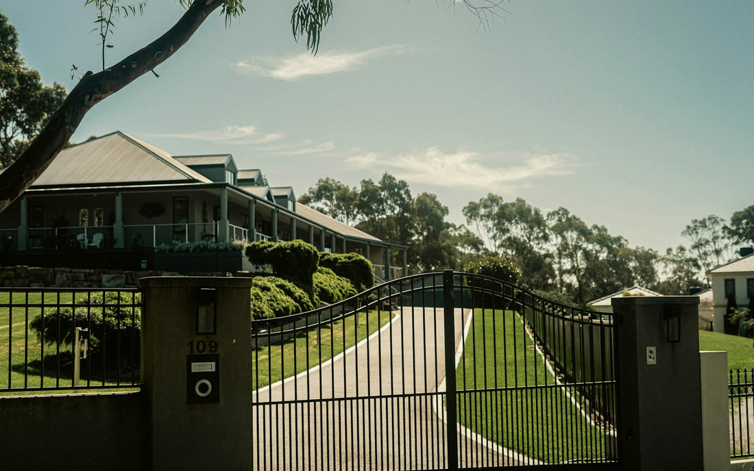 Automatic gate at the driveway of a modern home
