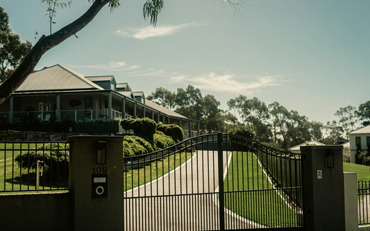Automatic gate at the driveway of a modern home