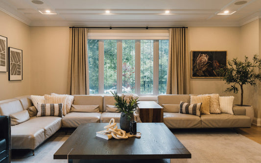 Living room with a large window and curtains